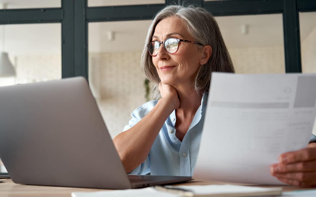 Smiling,Mature,Middle,Aged,Business,Woman,Using,Laptop,Working,On